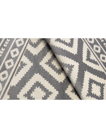 Dettaglio tappeto a metà prezzo