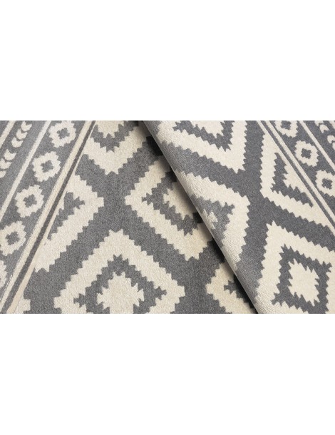 Dettaglio tappeto a metà prezzo