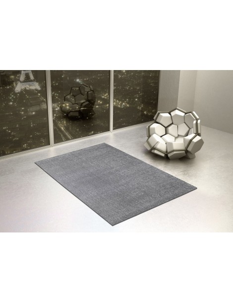 Tappeto tinta piatta dal design moderno in ambientazione